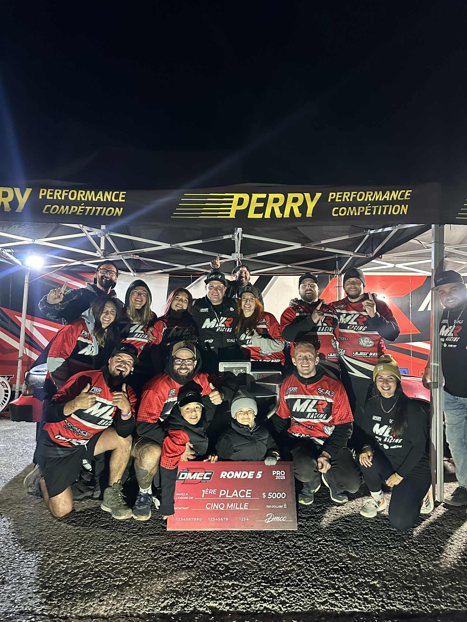 MLR Racing team celebrating after a drift competition result